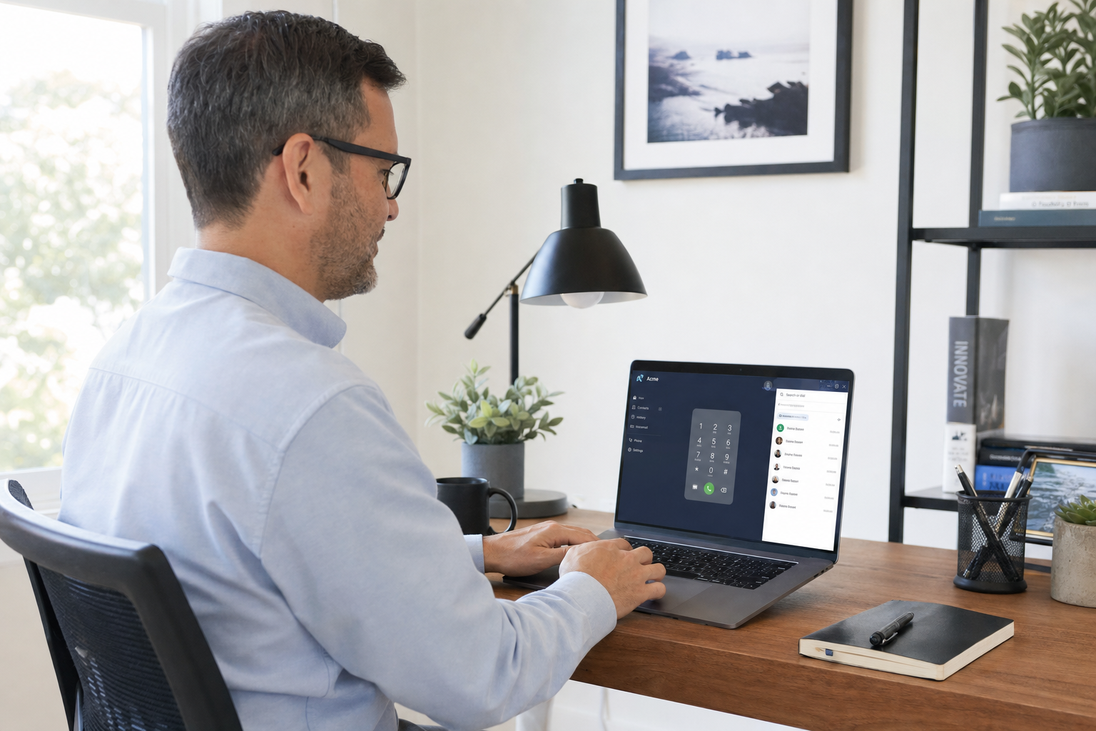 Remote employee using a VoIP softphone application on a laptop to receive business calls